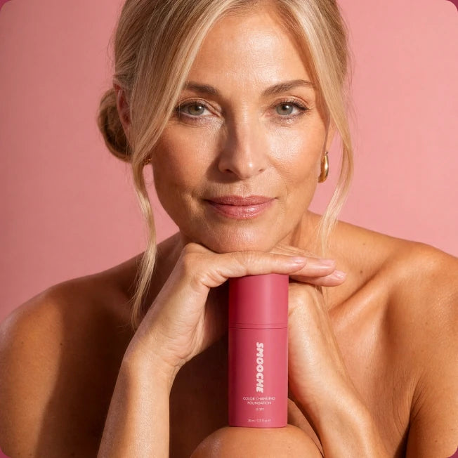 Woman resting her chin on her hands beside Smooche foundation