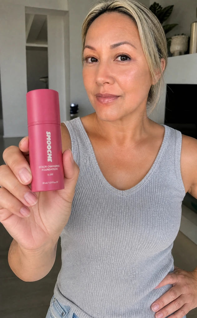 Customer holding Smooche foundation