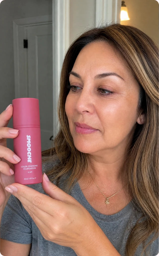 Customer holding Smooche foundation