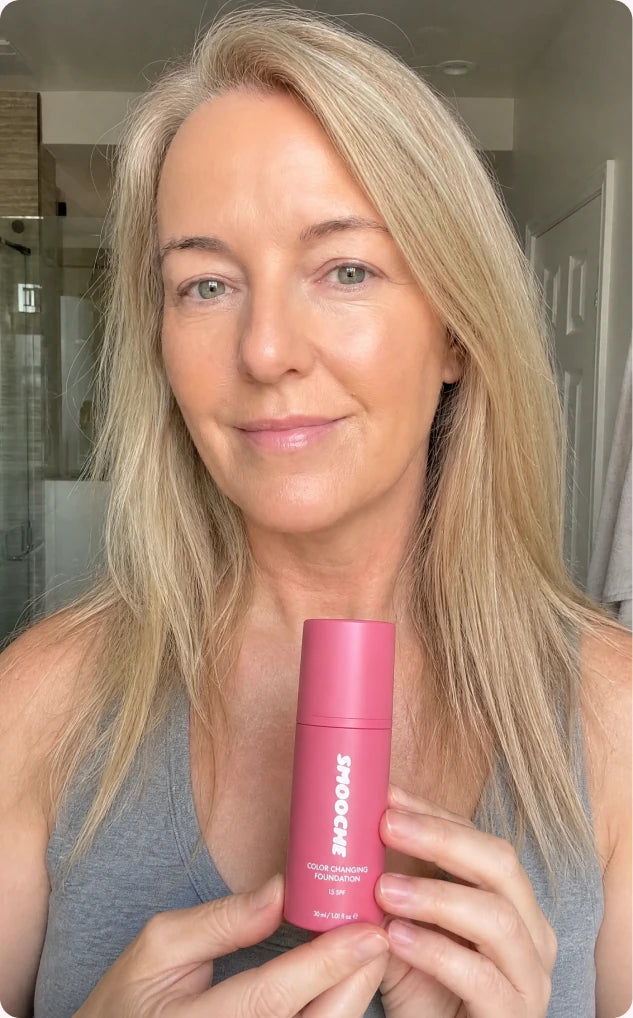 Customer holding Smooche foundation