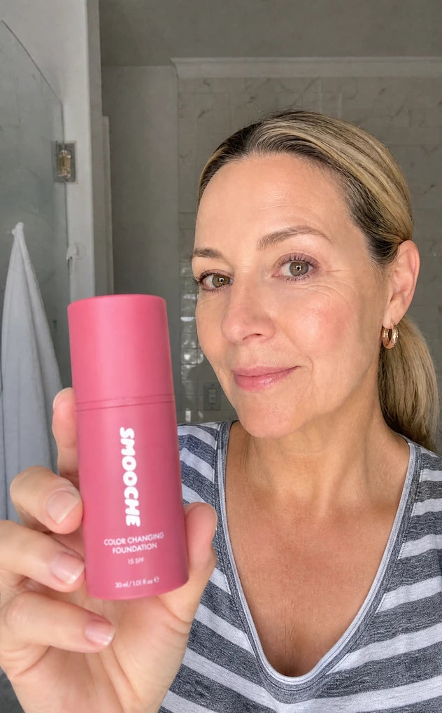 Customer holding Smooche foundation